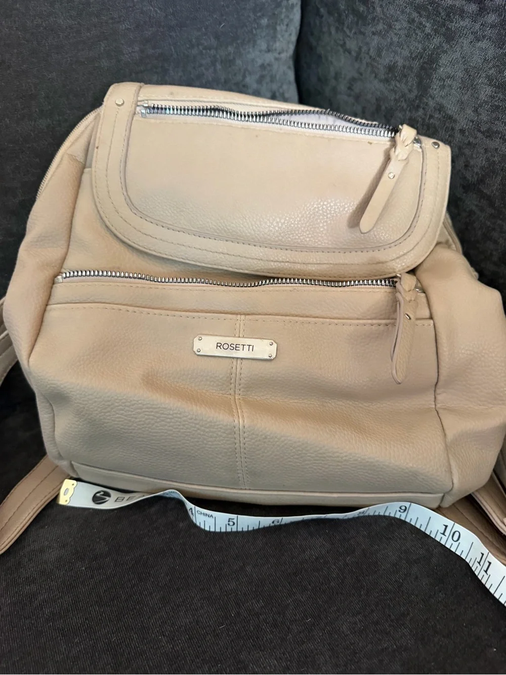Rosetti Light Beige Pebbled Leather Backpack with Front Zip Pocket
